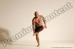 Underwear Gymnastic poses Man Black Muscular Bald Dancing Dynamic poses Academic